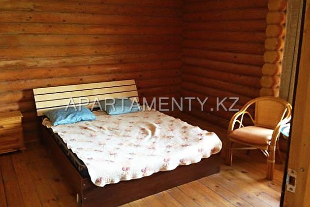 2-bed room in the wooden house